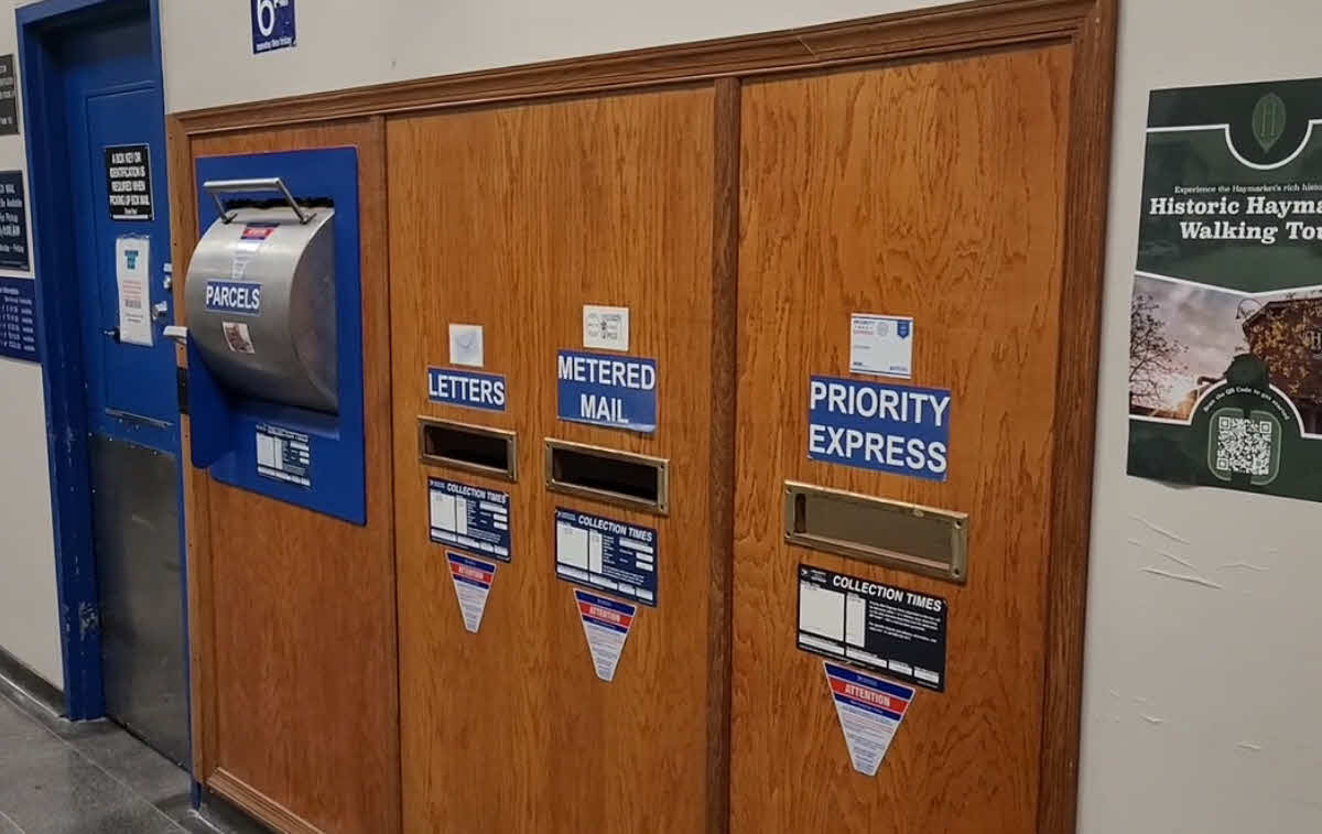 Indoor blue USPS mail collection box